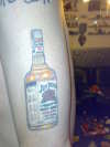 whisky bottle with kids names tattoo