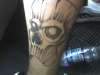 everybody wears a mask tattoo