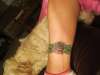 rose anklet tattoo