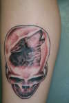 skull and wolf tattoo