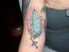 tattooed praying hands