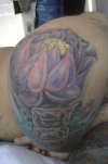 lotus flower right elbow tattoo