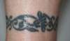 Ankle band tattoo