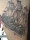 rugged pirate ship tattoo