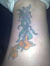 orange lillies tattoo