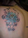 Blue flower tattoo