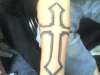 black cross tattoo