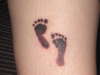 Our son's footprints tattoo
