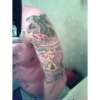 Upper arm sleve tattoo