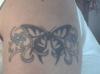 Rens tribal b-fly tattoo