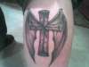 Cross w/ Bat Wings tattoo