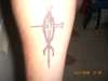Cross with fish tattoo