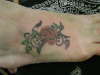 Rose on a foot tattoo