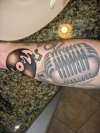 Vinil and mic tattoo