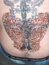 aztec and gargoyle mixed. tattoo