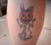 Rabbit With a Pumpkin Head tattoo