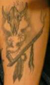 Steer Skull & Peace Pipe tattoo
