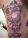 clown by justice tattoo