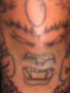 demon on my elbow tattoo
