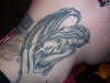 evil angel tattoo
