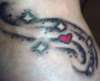 healed heart and stars tattoo