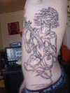 Side guitar player tattoo