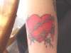 heart/barb wire tattoo