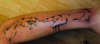 famous painting......of god and a angle touching hands tattoo