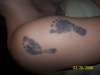 footprints tattoo