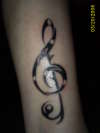 Treble clef tattoo