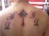 Cross with intials and Filipino Sun tattoo