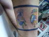 KOKOPELLI  AROUND THE LEG tattoo