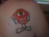 angry m&m tattoo