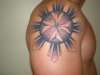 filo sun n maltese cross tattoo
