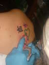 Sisterly love tattoo