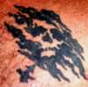 Skull in the Smoke tattoo