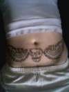 skull & wings tattoo