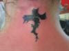 Cross on back of my neck tattoo