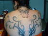 Tribal cover up tattoo