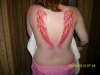 my wifes wings tattoo