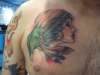 Gypsy with Puerto Rican parrot tattoo