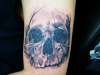 another skull tattoo