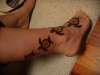 4 sea turtles tattoo