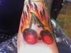 Flaming cherrys tattoo