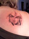 Fantasy shoulder tattoo