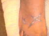 cross and dove tattoo