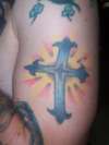 cross w/ rays tattoo