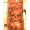 Ed Hardys Love Kills Slowly by David @ Anchors Aweigh tattoo