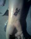 butterfly on wrist tattoo