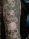 skulled out tattoo